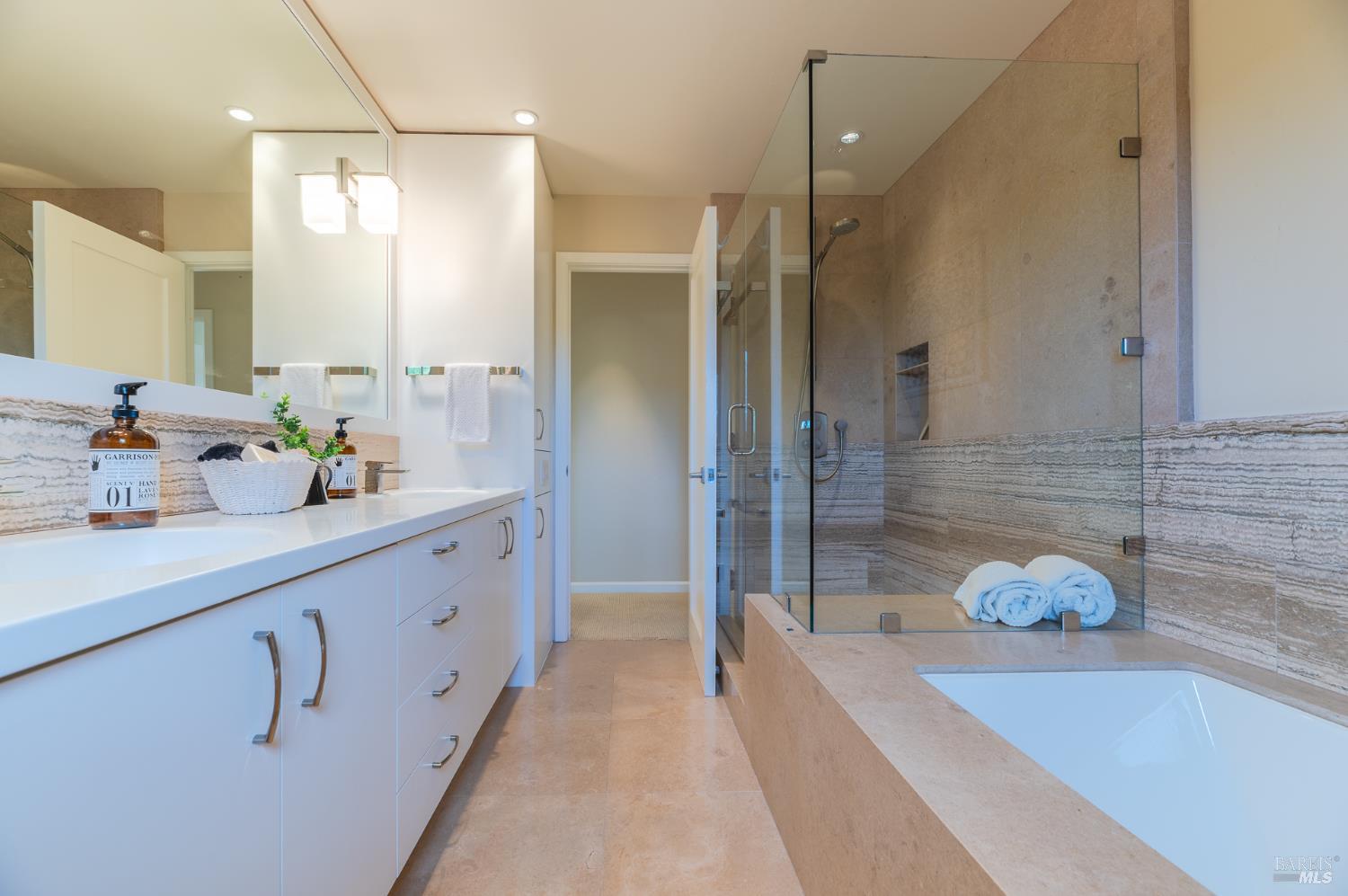 4 Galway Lane San Rafael, CA 94903 - Photo 24 of 45 a bathroom with a tub sink and glass door shower