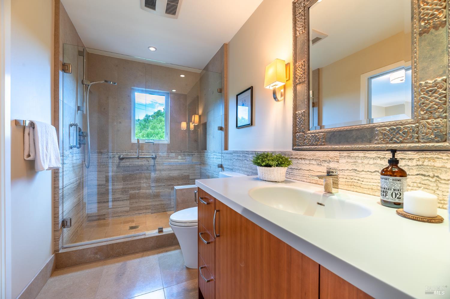 4 Galway Lane San Rafael, CA 94903 - Photo 26 of 45 a bathroom with a sink a toilet and shower