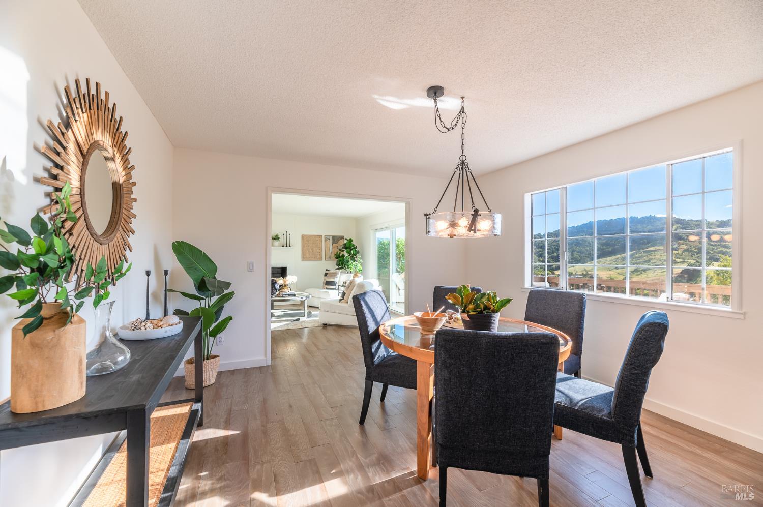 4 Galway Lane San Rafael, CA 94903 - Photo 6 of 45 a view of a dining room with furniture window and wooden floor