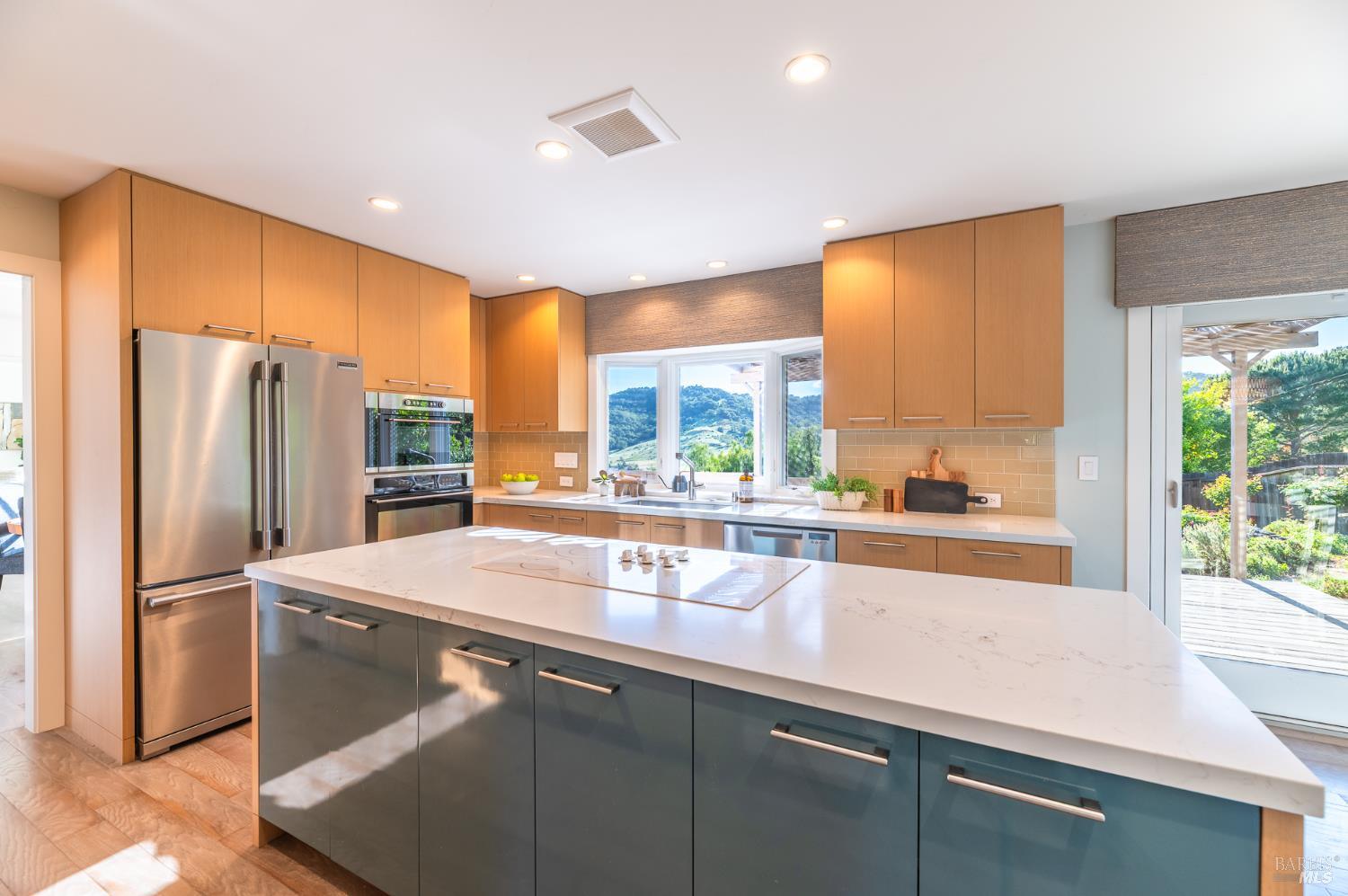 4 Galway Lane San Rafael, CA 94903 - Photo 9 of 45 a kitchen with refrigerator a sink and a large window