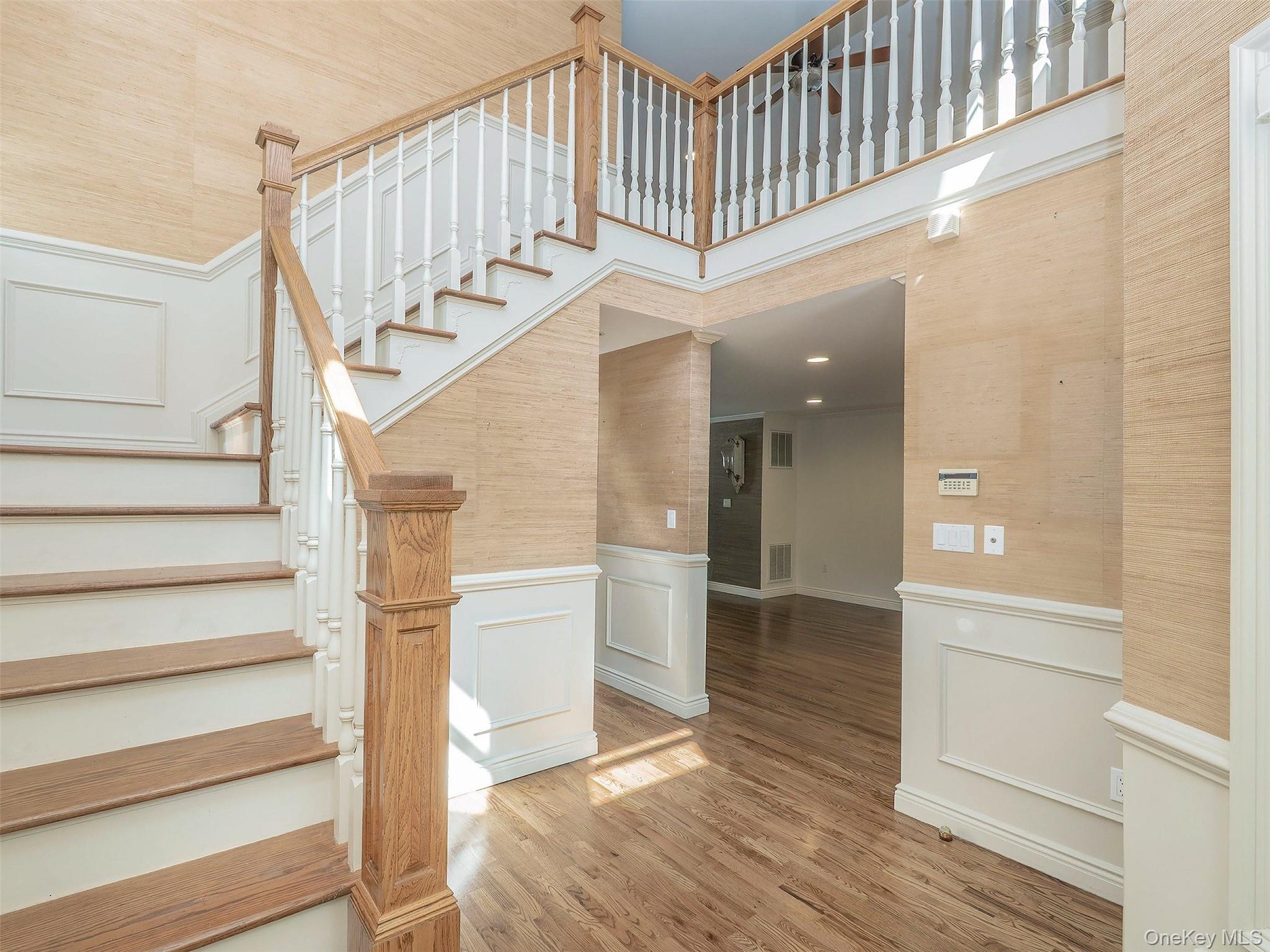 21 Marwood Road North Port Washington, NY 11050 - Photo 3 of 35 a view of entryway and hall with wooden floor
