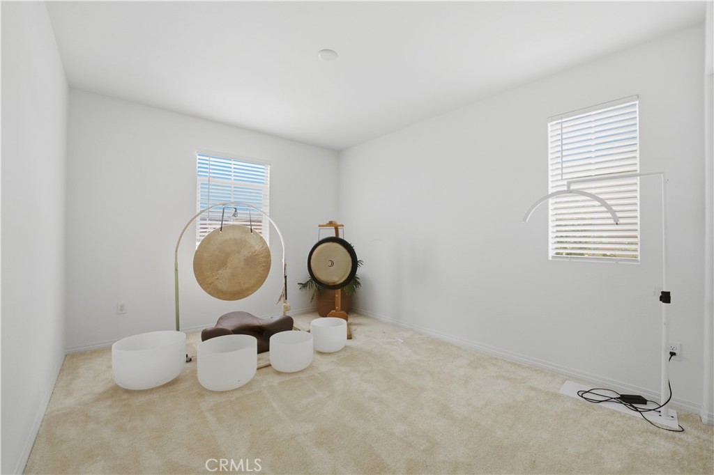 2522 Gunner Ridge Way Rialto, CA 92377 - Photo 24 of 28 a view of dining room cabinets and a window