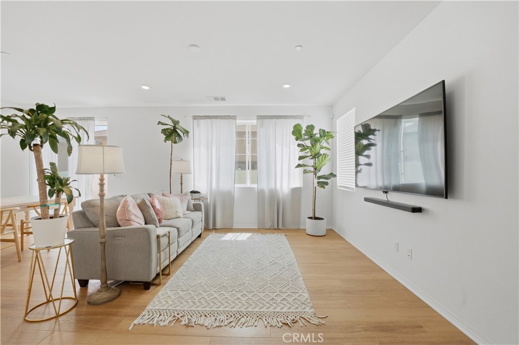 2522 Gunner Ridge Way Rialto, CA 92377 - Photo 6 of 28 a living room with furniture and a large window