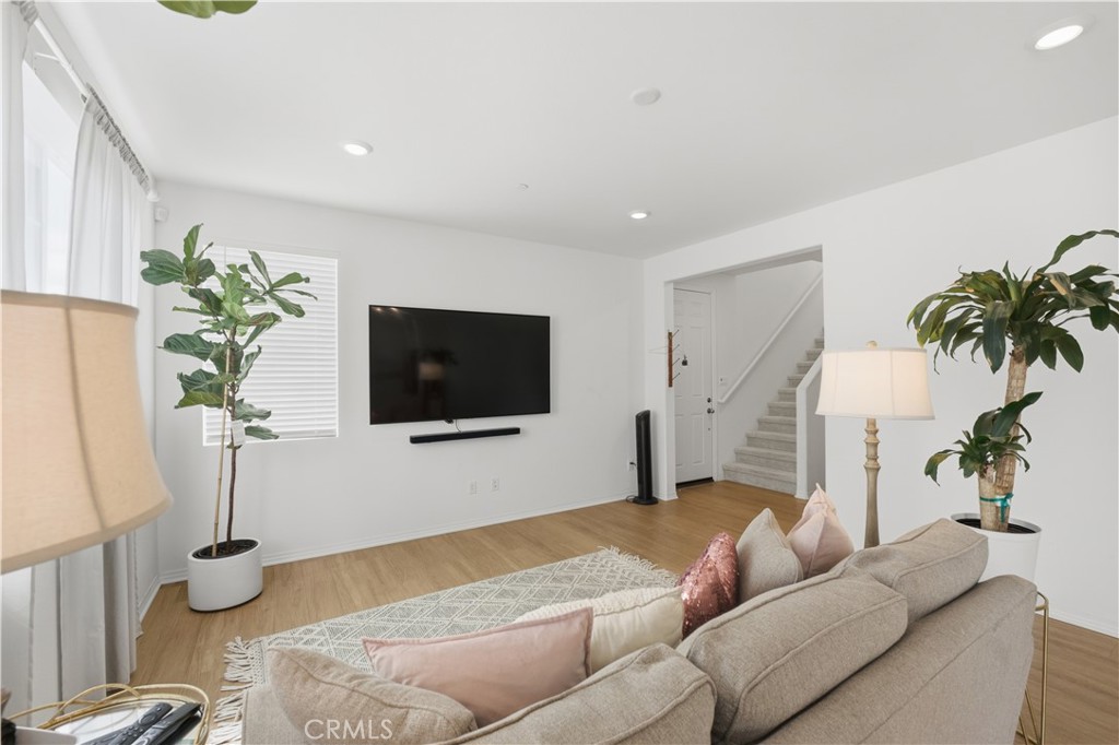 2522 Gunner Ridge Way Rialto, CA 92377 - Photo 7 of 28 a living room with furniture and a flat screen tv
