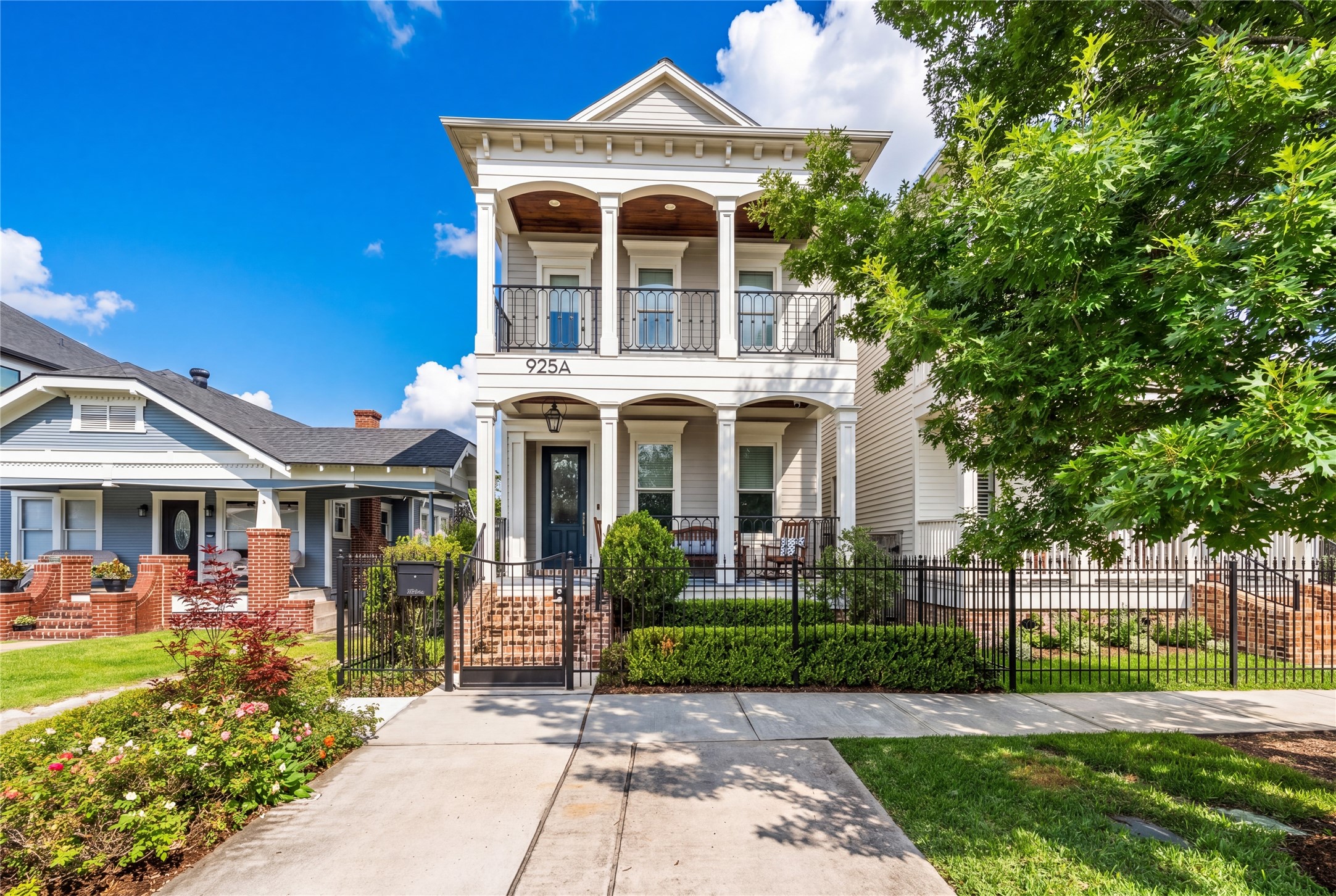 925 Tulane Street, Unit A Houston, TX 77008 - Photo 4 of 49 Creole-style single family home delivers major curb appeal on coveted Tulane Street with its handsome façade and mature, manicured landscaping.