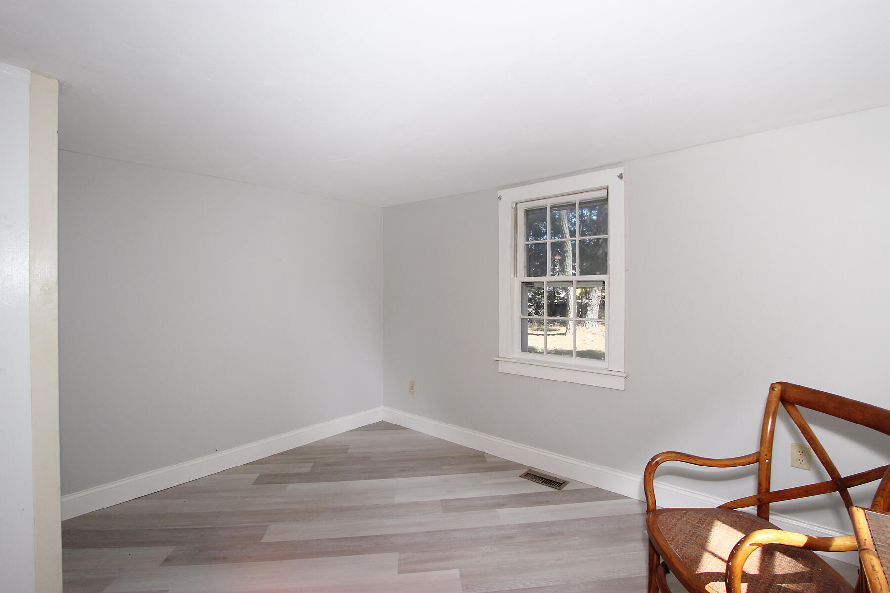 184 Sisson Road Harwich, MA 02645 - Photo 13 of 22 a view of a room with wooden floor and windows