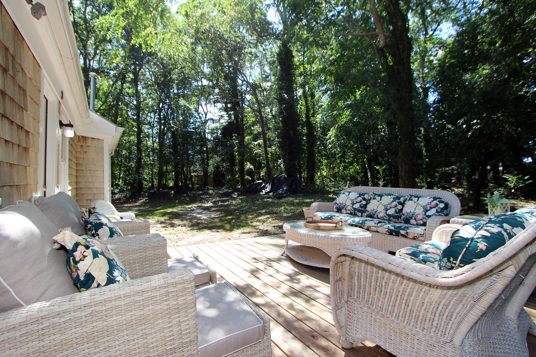 184 Sisson Road Harwich, MA 02645 - Photo 22 of 22 a view of a couches and lounge chairs in patio