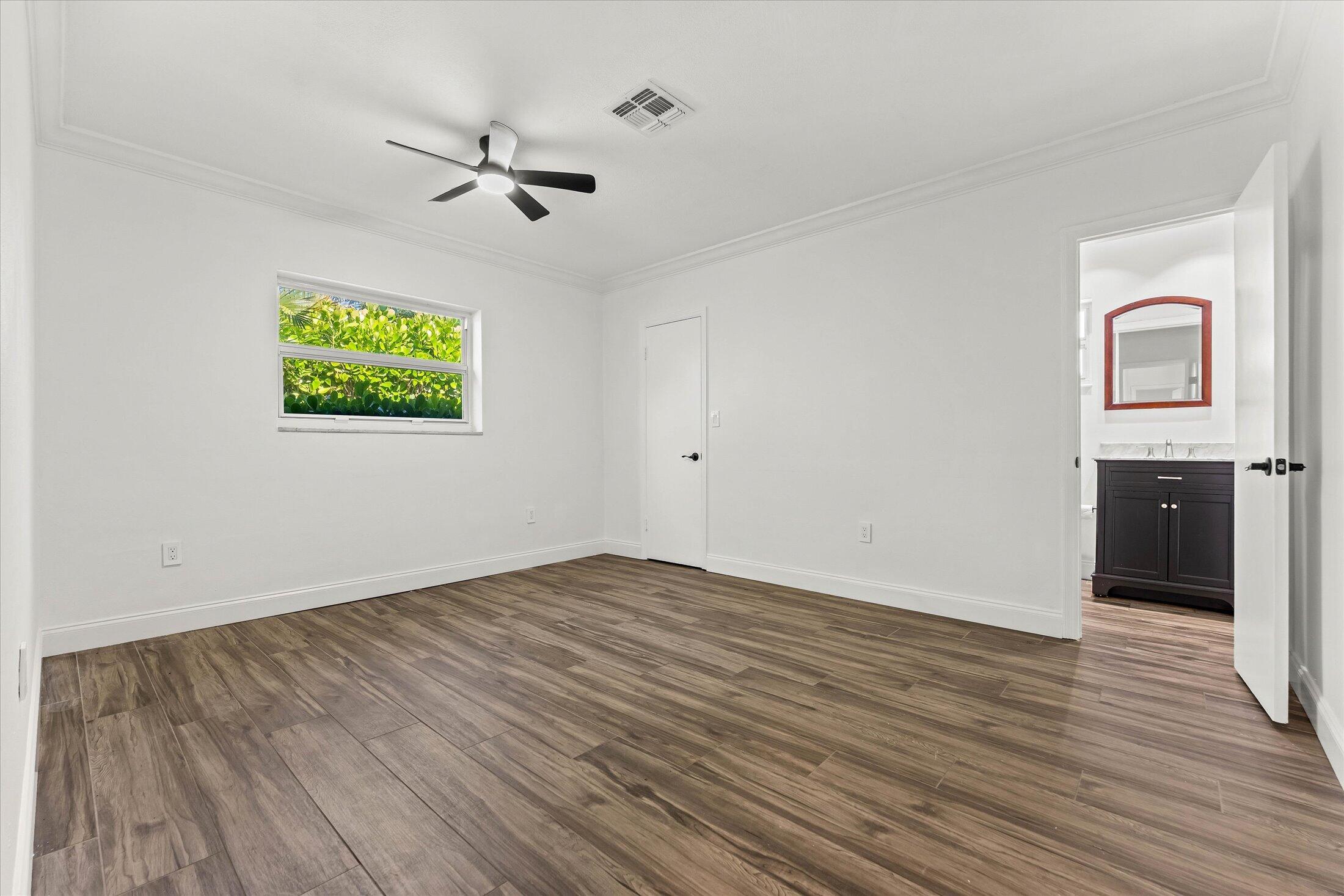 884 Northwest 6th Drive Boca Raton, FL 33486 - Photo 18 of 37 Primary Bedroom