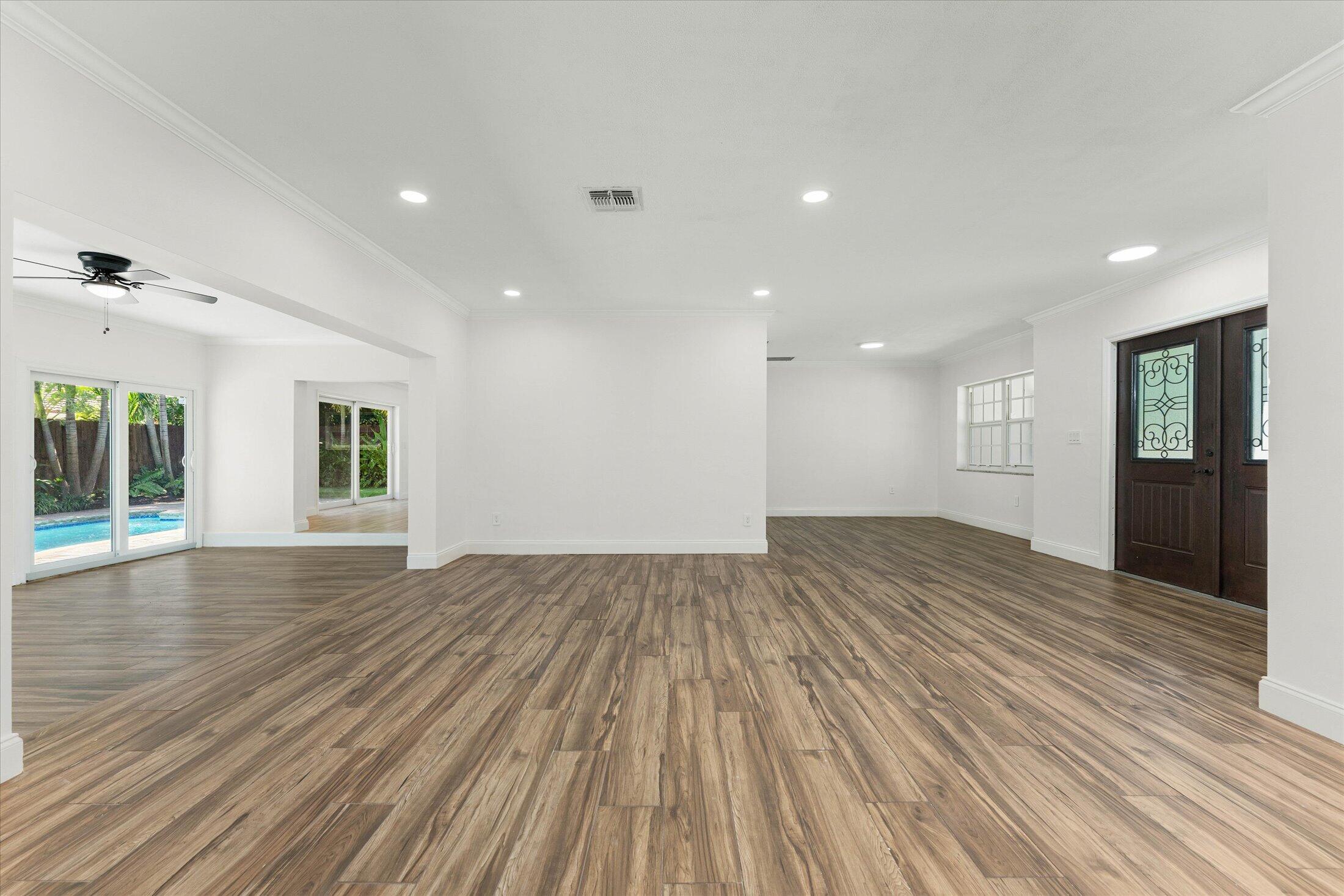 884 Northwest 6th Drive Boca Raton, FL 33486 - Photo 5 of 37 Living/Dining/Front Door