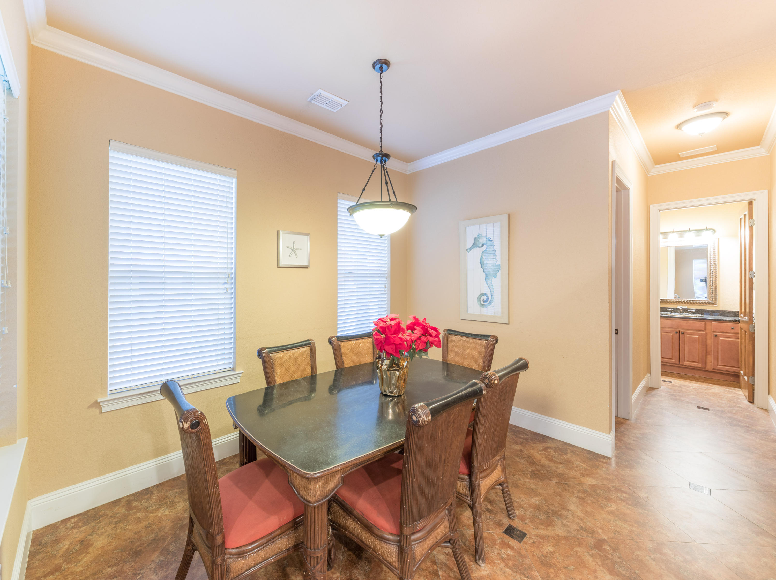 4554 Biscayne Way Destin, FL 32541 - Photo 11 of 24 a dining room with furniture and window