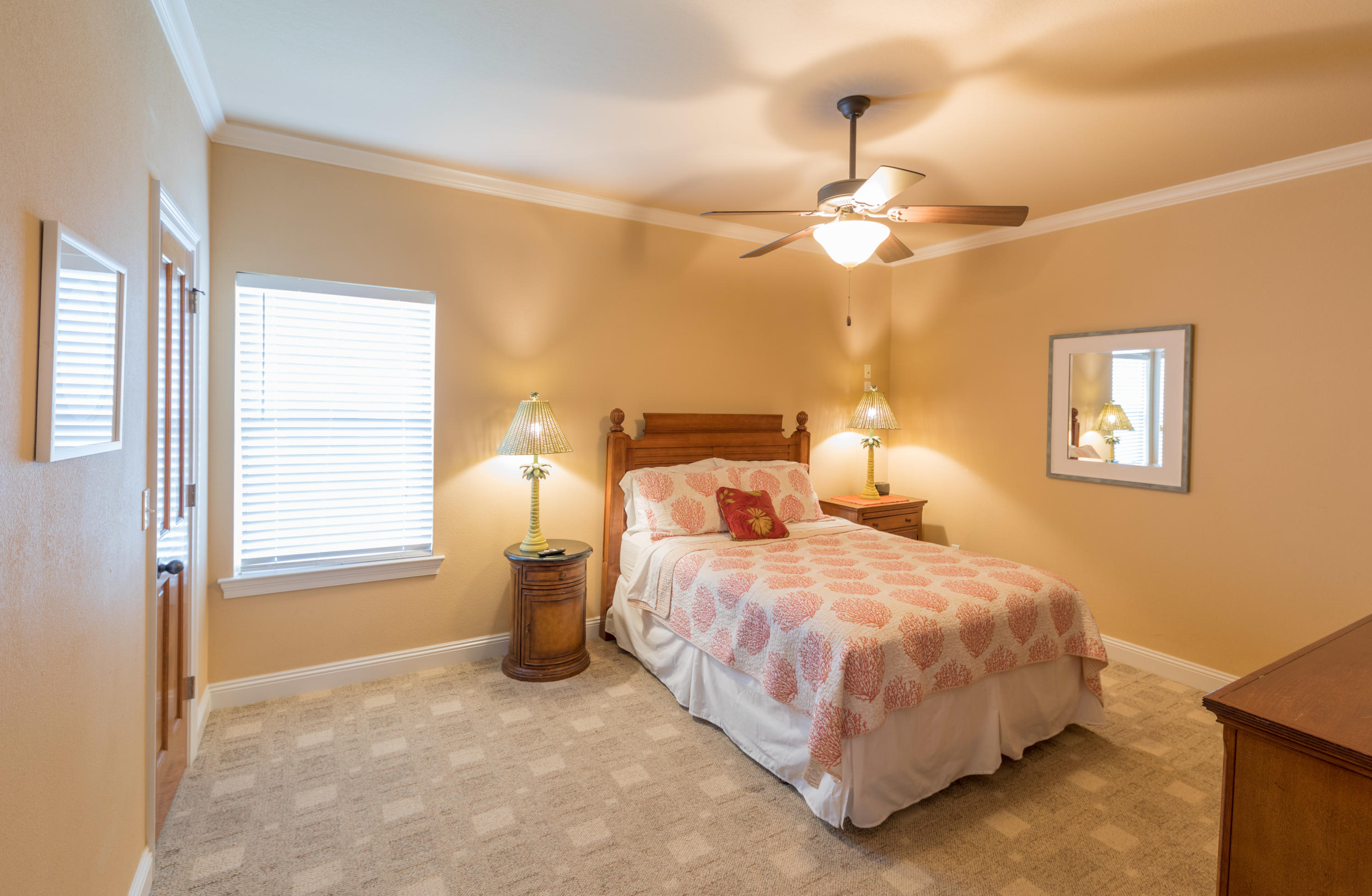 4554 Biscayne Way Destin, FL 32541 - Photo 21 of 24 a bedroom with bed and window
