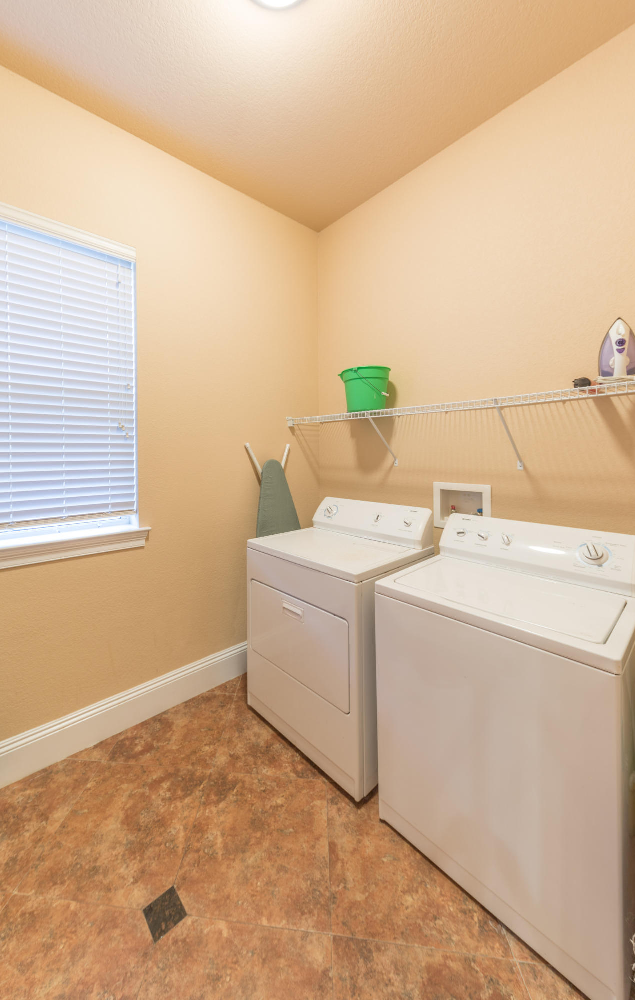 4554 Biscayne Way Destin, FL 32541 - Photo 24 of 24 a utility room with dryer and washer