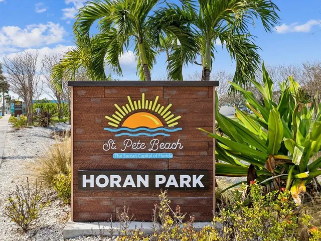 a picture of a city with a lake view