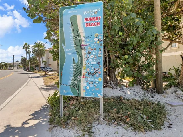 a sign that is on the side of a road