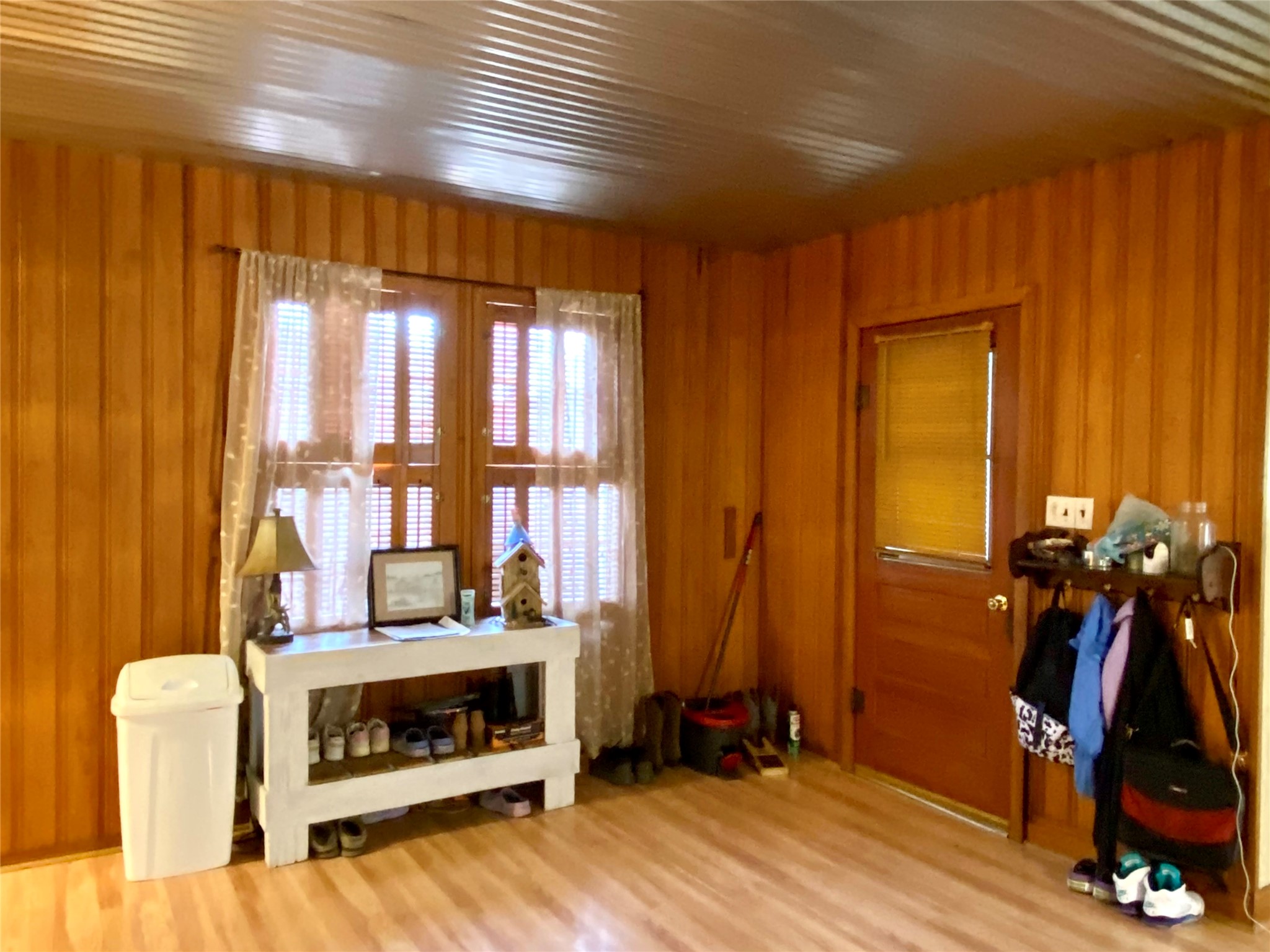 6814 Church Street Wallis, TX 77485 - Photo 12 of 29 a view of an empty room with a fireplace and windows