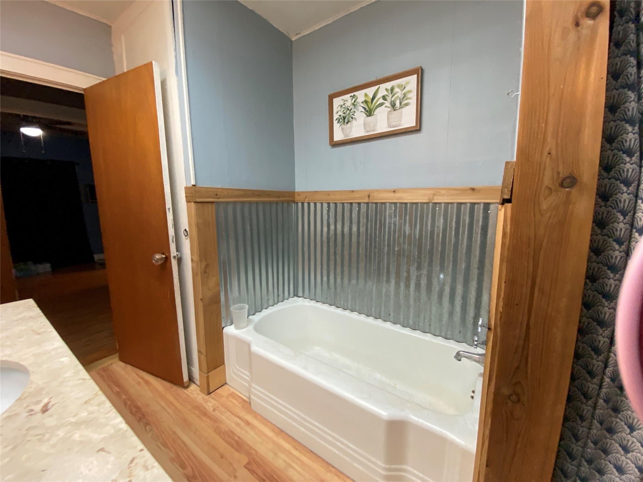 6814 Church Street Wallis, TX 77485 - Photo 15 of 29 a bathroom with a bathtub and a shower