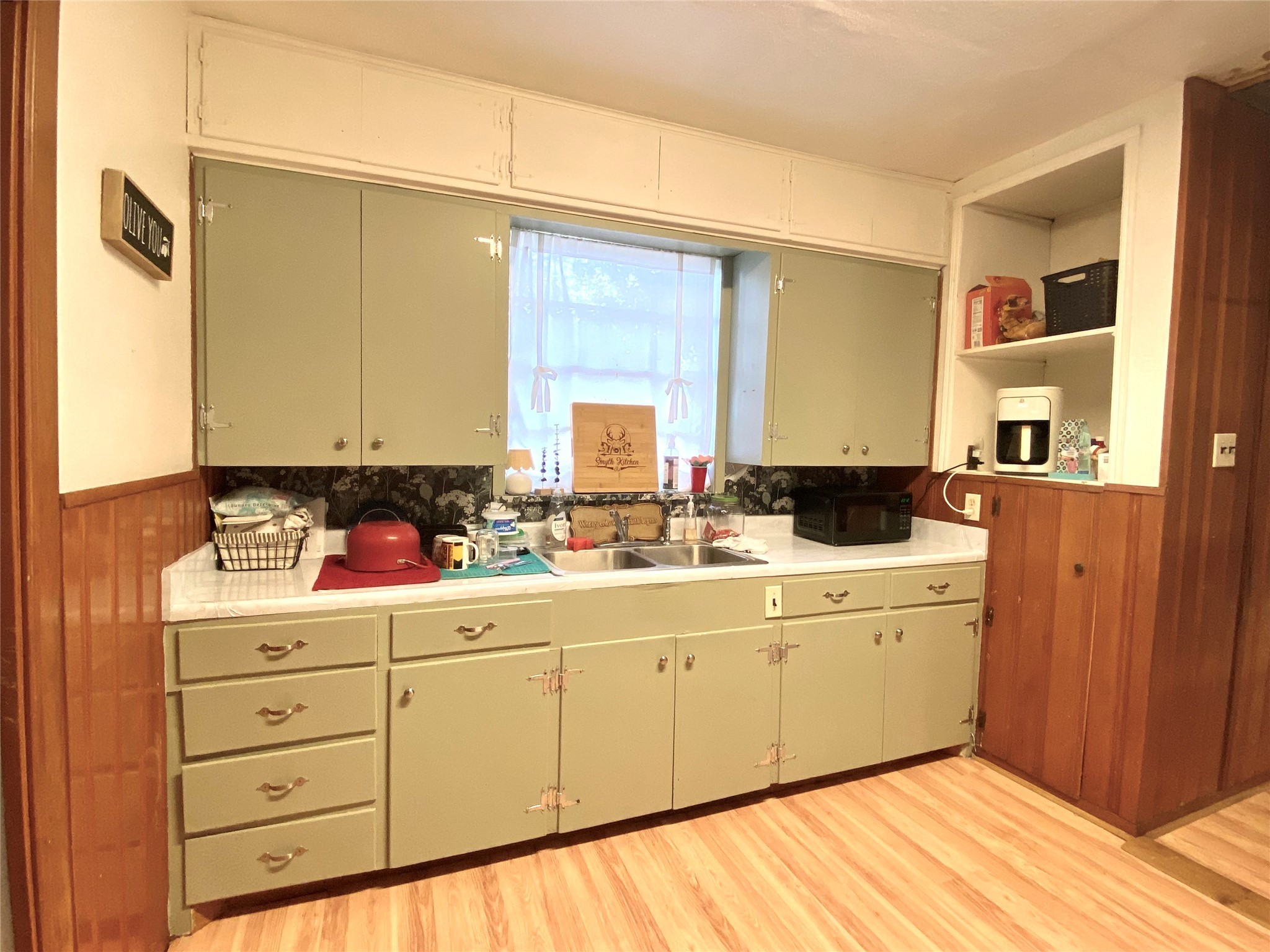 6814 Church Street Wallis, TX 77485 - Photo 8 of 29 a kitchen with sink cabinets and window