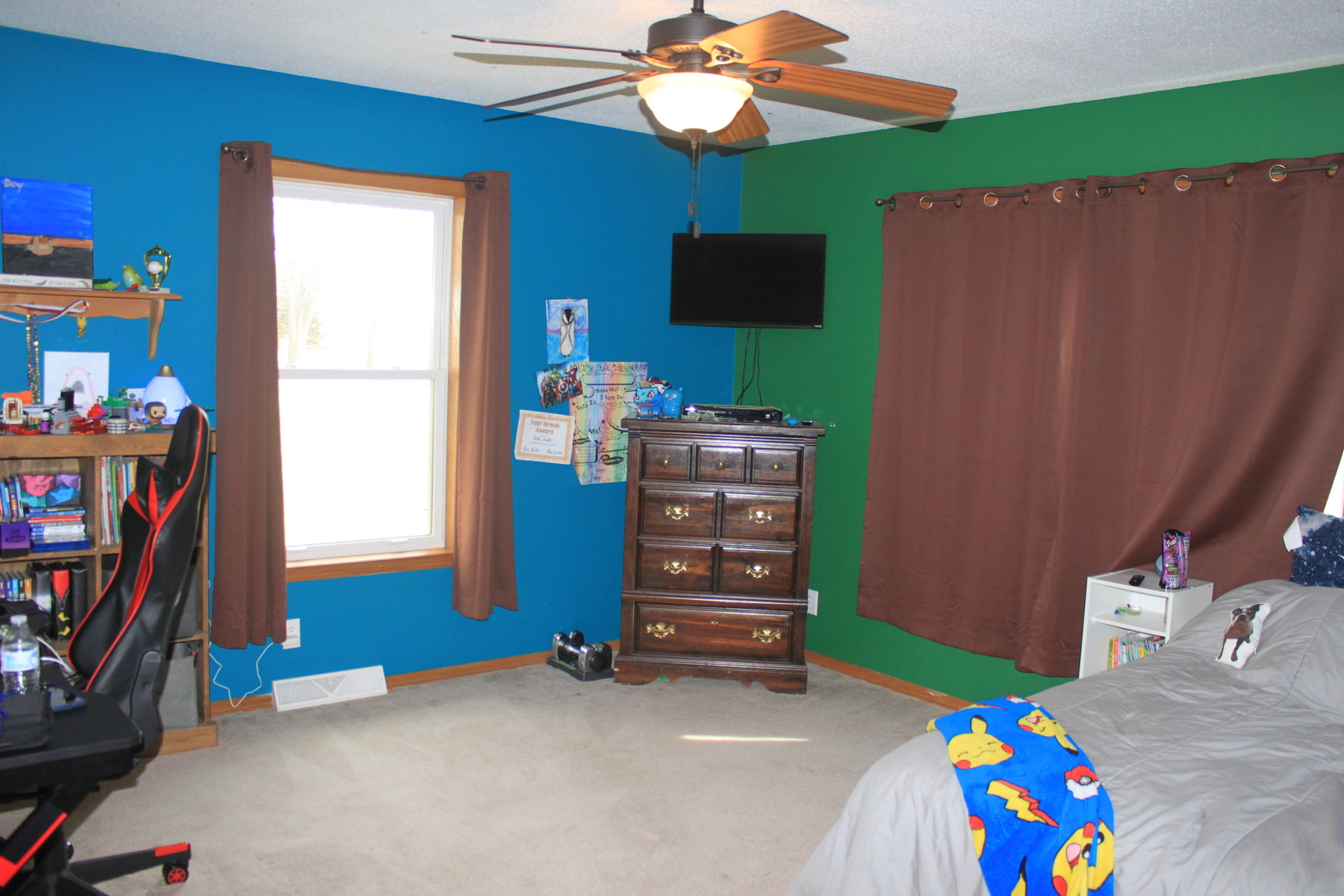 22862 Prophet Road Rock Falls, IL 61071 - Photo 12 of 24 a bedroom with a bed and a bookshelf