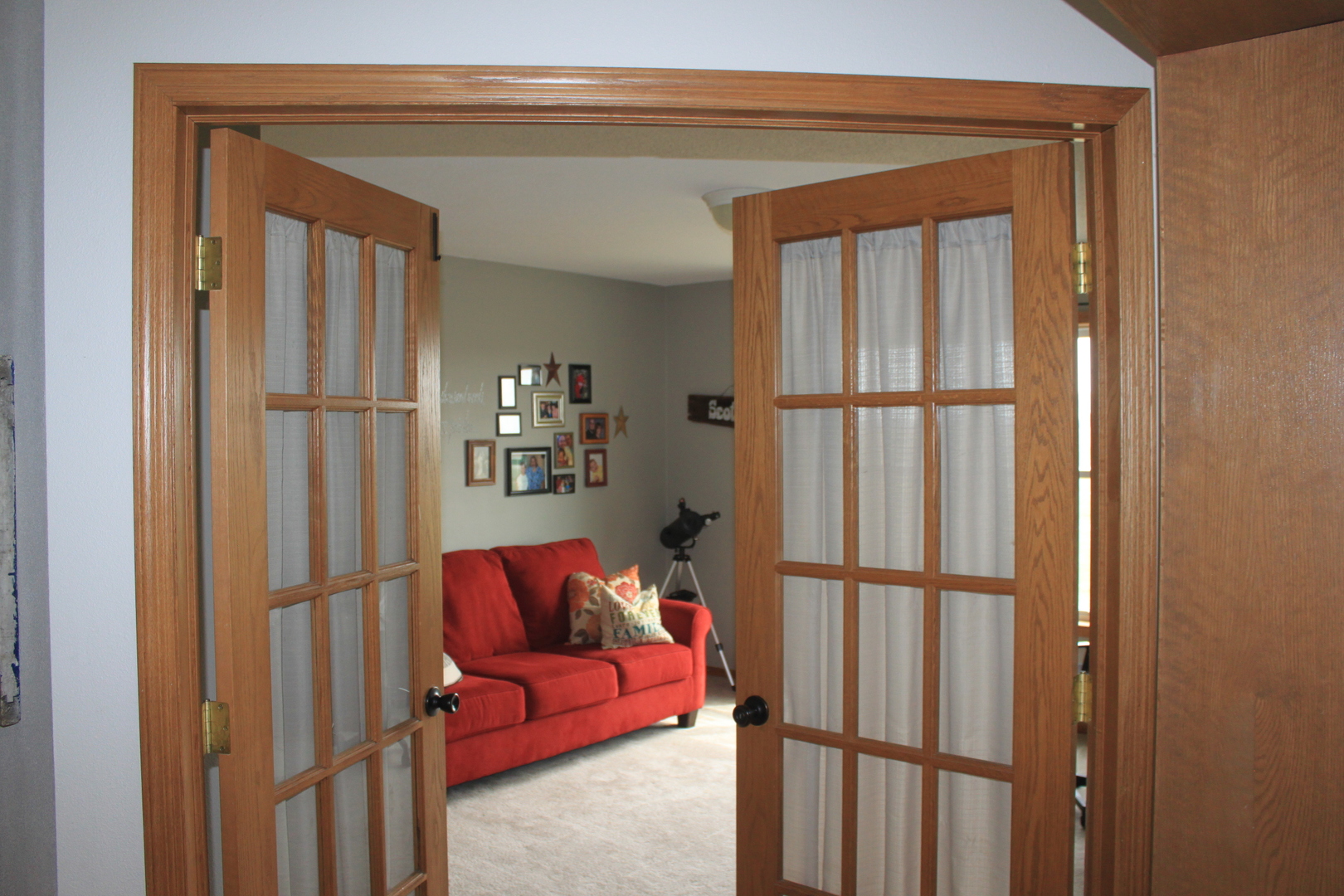 22862 Prophet Road Rock Falls, IL 61071 - Photo 7 of 24 a hallway with a couch and a potted plant on it