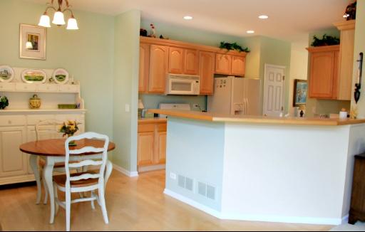1871 Wagner Road Batavia, IL 60510 - Photo 4 of 16 a kitchen with a sink and chairs
