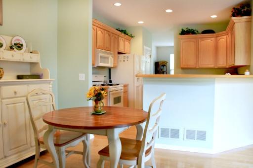 1871 Wagner Road Batavia, IL 60510 - Photo 5 of 16 a kitchen with a table chairs and a refrigerator