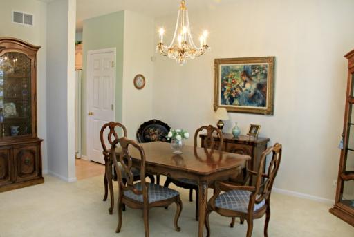 1871 Wagner Road Batavia, IL 60510 - Photo 8 of 16 a view of a dining room with furniture and chandelier