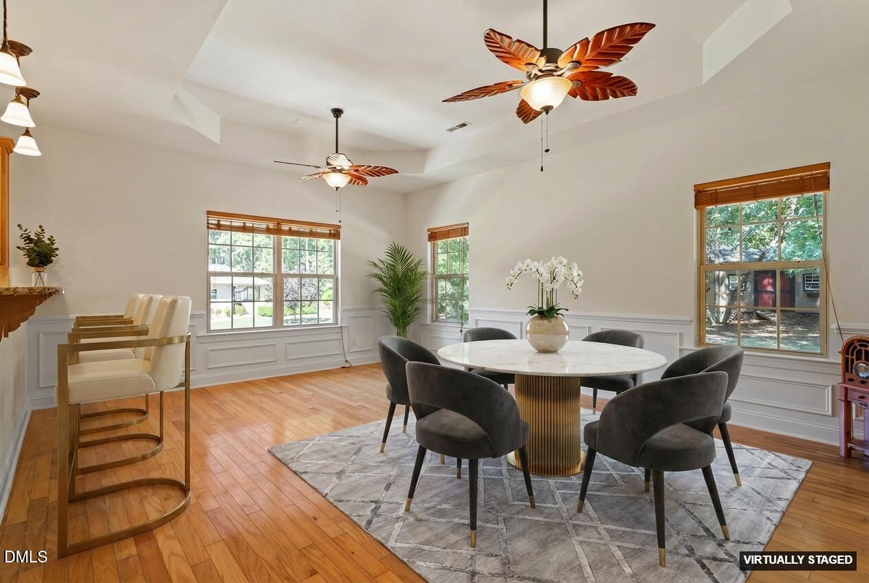 46 Spring Haven Lane Willow Spring, NC 27592 - Photo 24 of 50 a view of a dining room with furniture window and wooden floor
