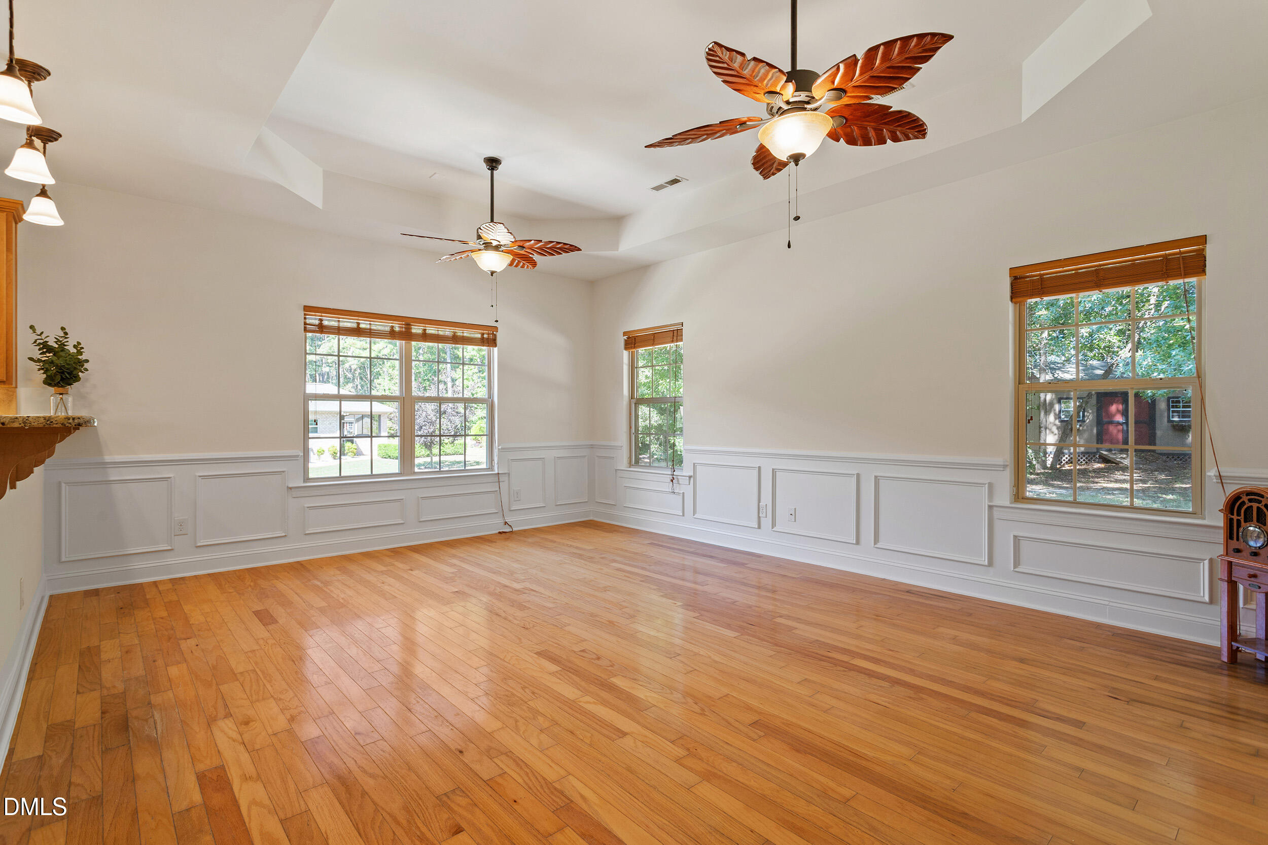 46 Spring Haven Lane Willow Spring, NC 27592 - Photo 25 of 50 a view of an empty room with a window and a kitchen