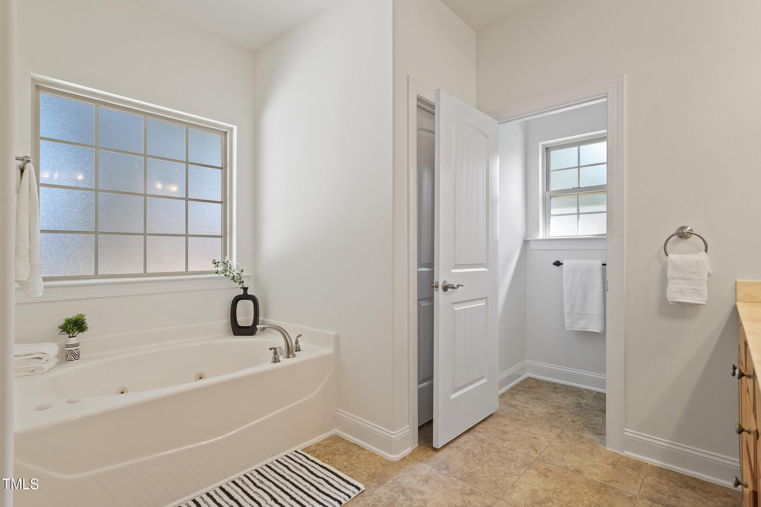 46 Spring Haven Lane Willow Spring, NC 27592 - Photo 33 of 50 a bathroom with a bathtub and a shower