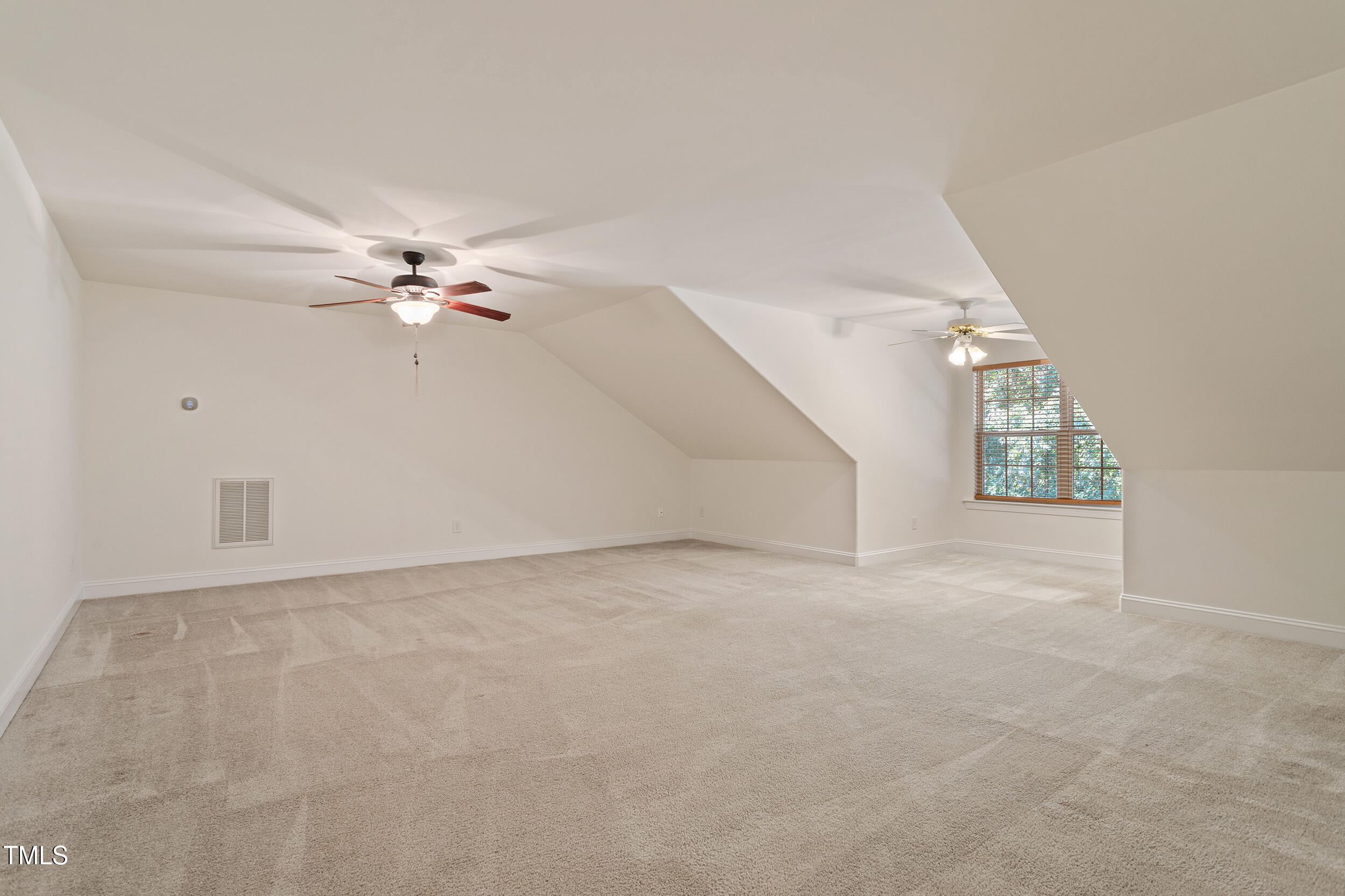 46 Spring Haven Lane Willow Spring, NC 27592 - Photo 39 of 50 a view of an empty room with a window