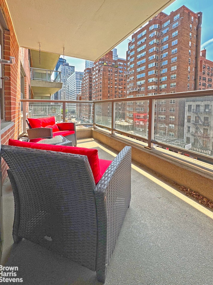 300 East 71st Street, Unit 6M Manhattan, NY 10021 - Photo 3 of 8 a view of building with outdoor space