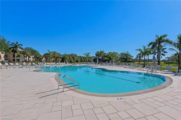 a view of a swimming pool and lake view