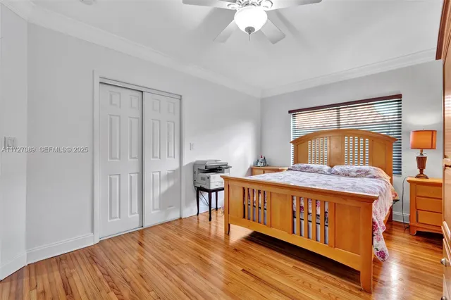 a bedroom with a bed and a table