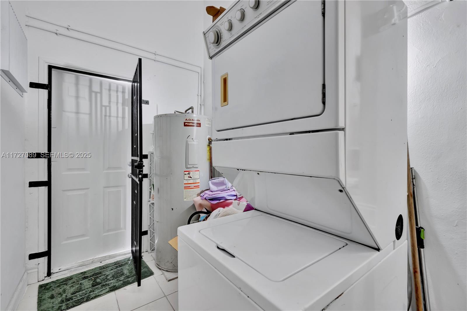 3541 Southwest 23rd Terrace Miami, FL 33145 - Photo 30 of 36 a utility room with dryer and washer