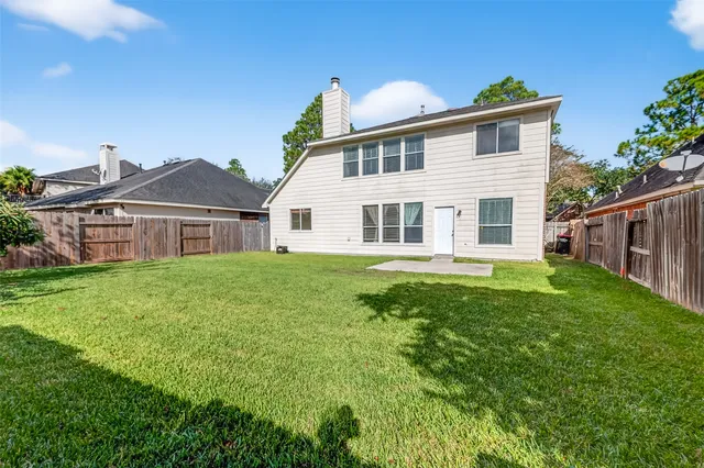 a view of a yard in front of a house