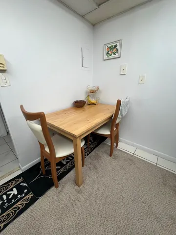 a room with furniture and a desk