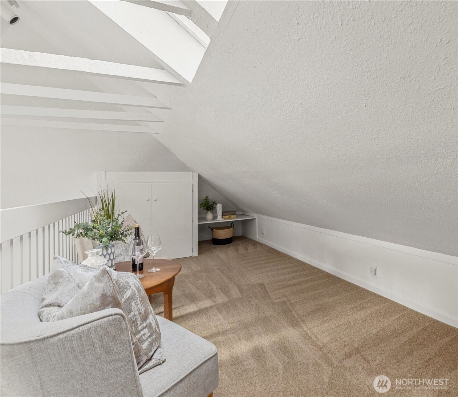 424 27th Avenue East Seattle, WA 98112 - Photo 18 of 36 a living room with furniture and flowers