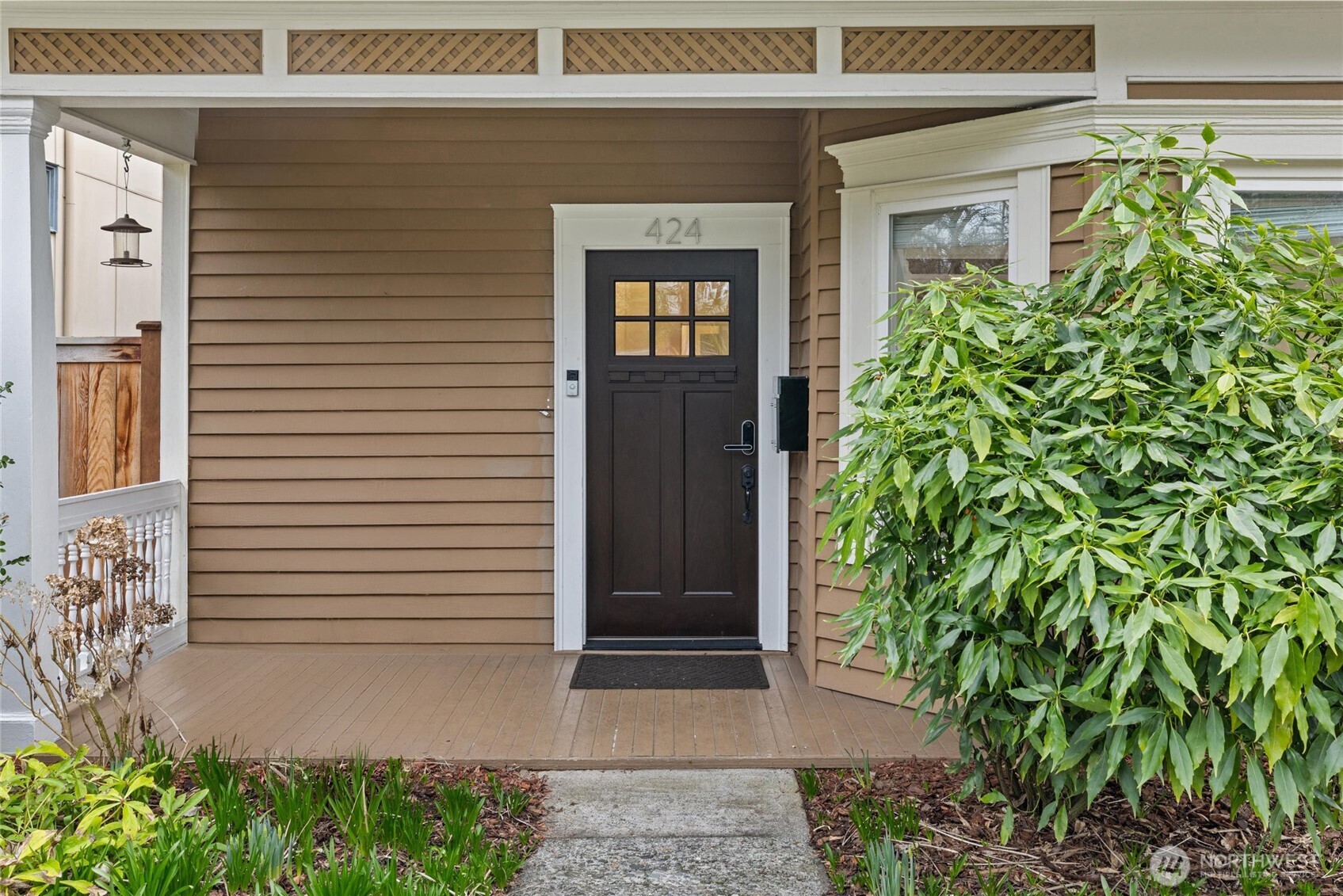 424 27th Avenue East Seattle, WA 98112 - Photo 2 of 36 a front view of a house with garden