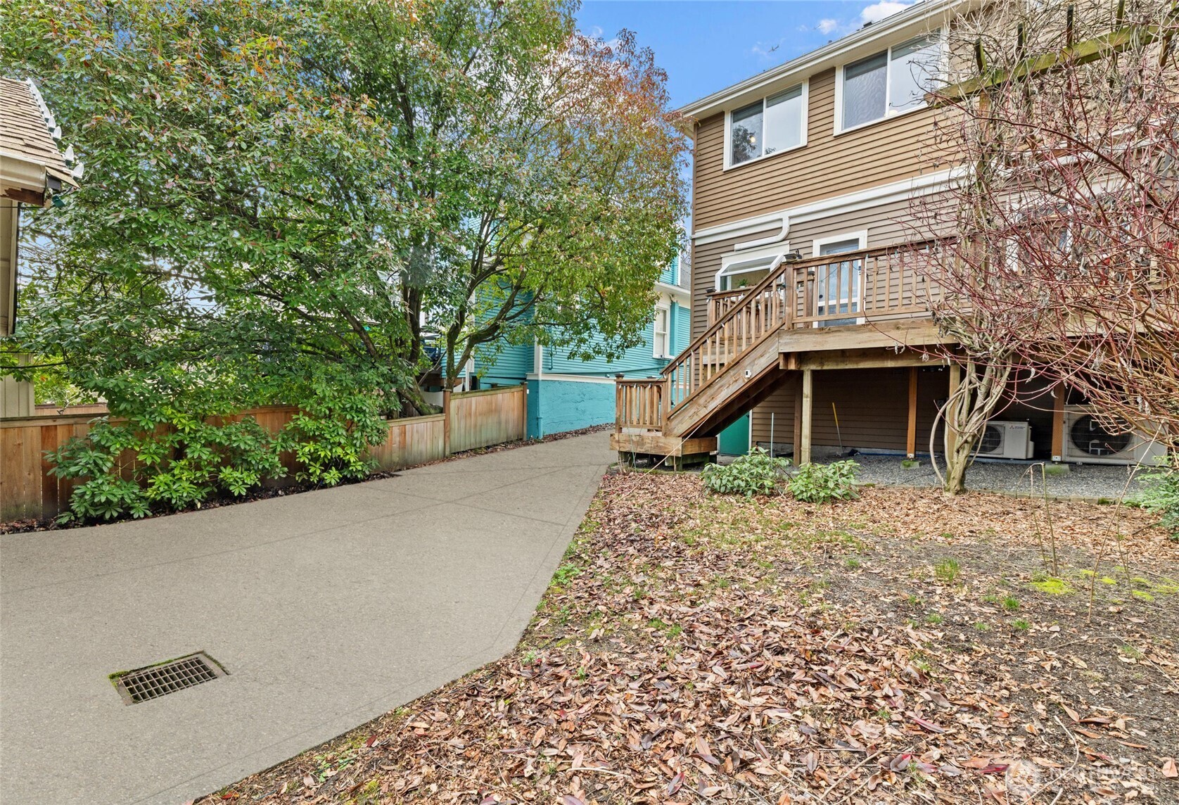424 27th Avenue East Seattle, WA 98112 - Photo 25 of 36 front view of a house with a yard