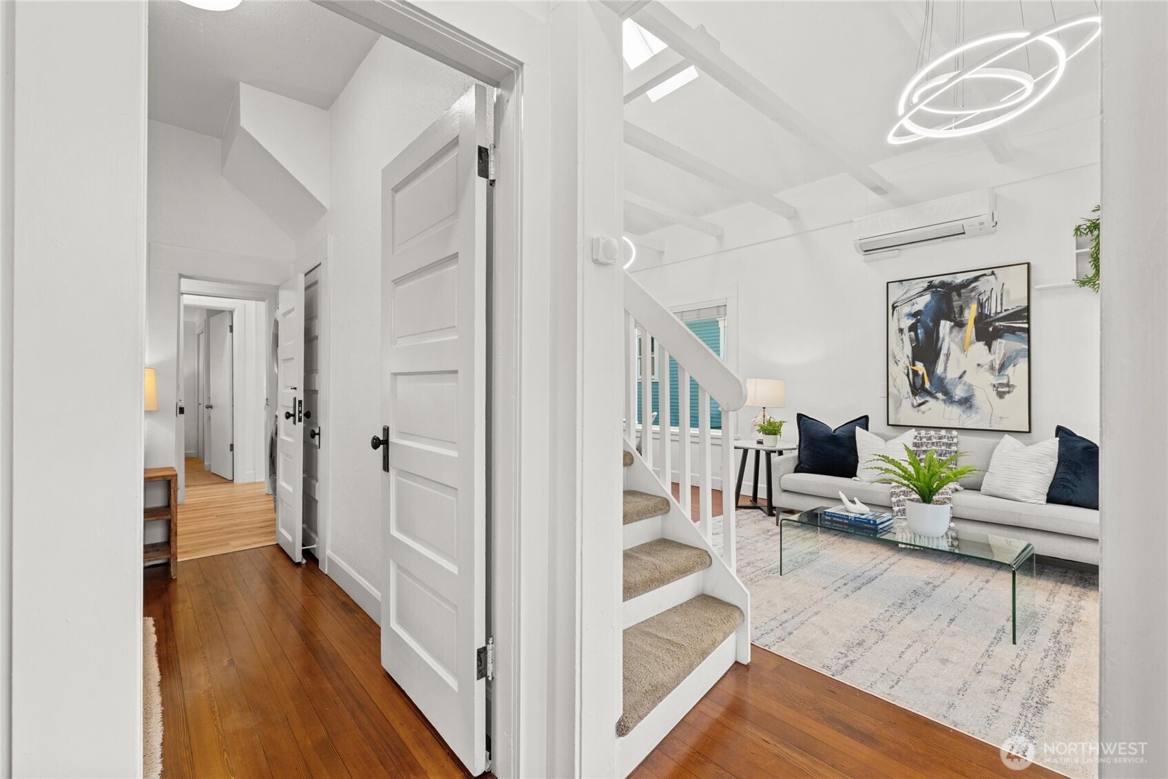 424 27th Avenue East Seattle, WA 98112 - Photo 3 of 36 a view of livingroom with furniture and wooden floor