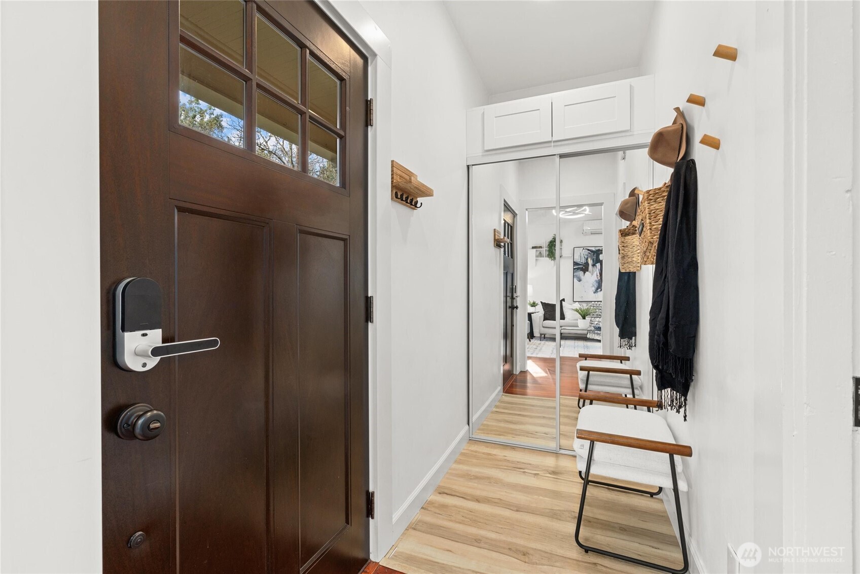 424 27th Avenue East Seattle, WA 98112 - Photo 4 of 36 a hallway with a door open to a room