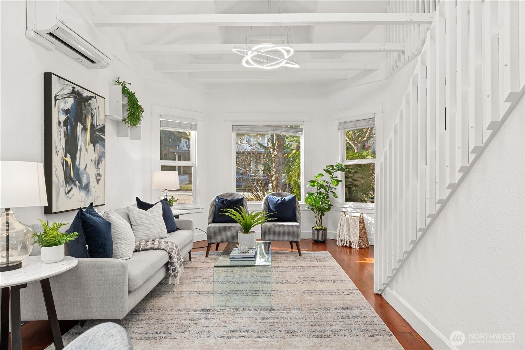 424 27th Avenue East Seattle, WA 98112 - Photo 7 of 36 a living room with furniture and wooden floor