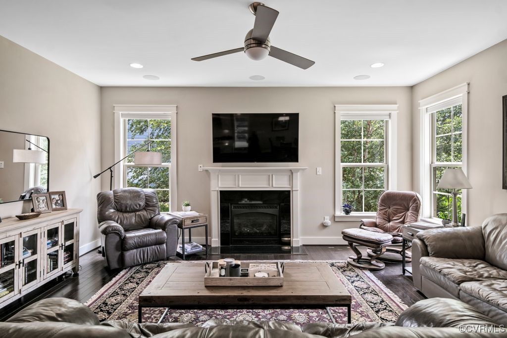 16413 Lambourne Road Midlothian, VA 23112 - Photo 12 of 33 a living room with furniture a fireplace and a flat screen tv