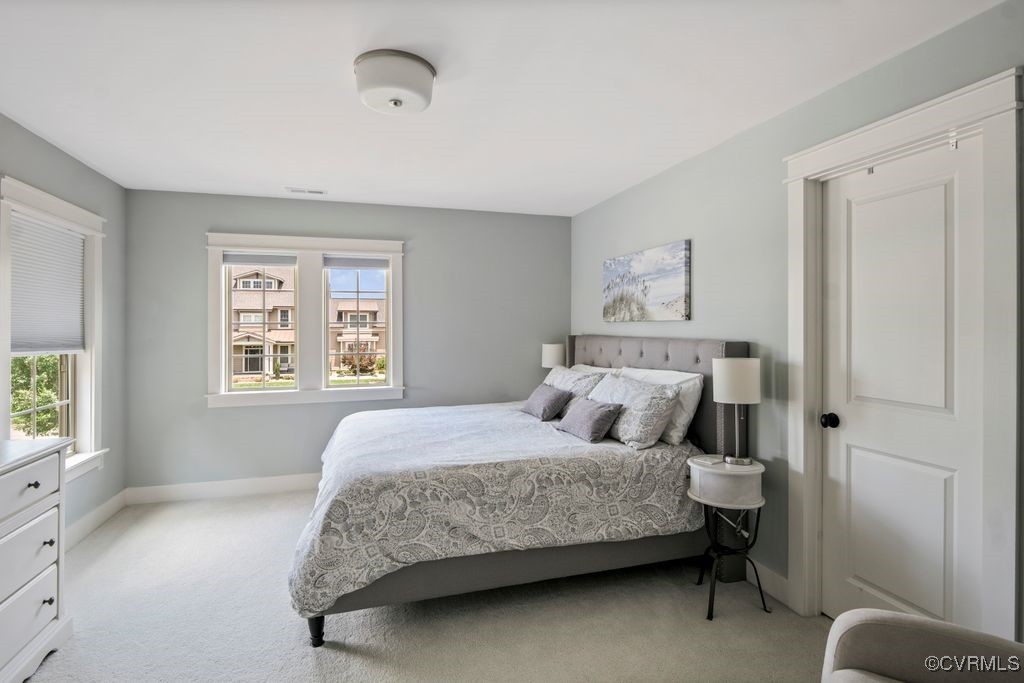 16413 Lambourne Road Midlothian, VA 23112 - Photo 16 of 33 a bedroom with a bed and a window