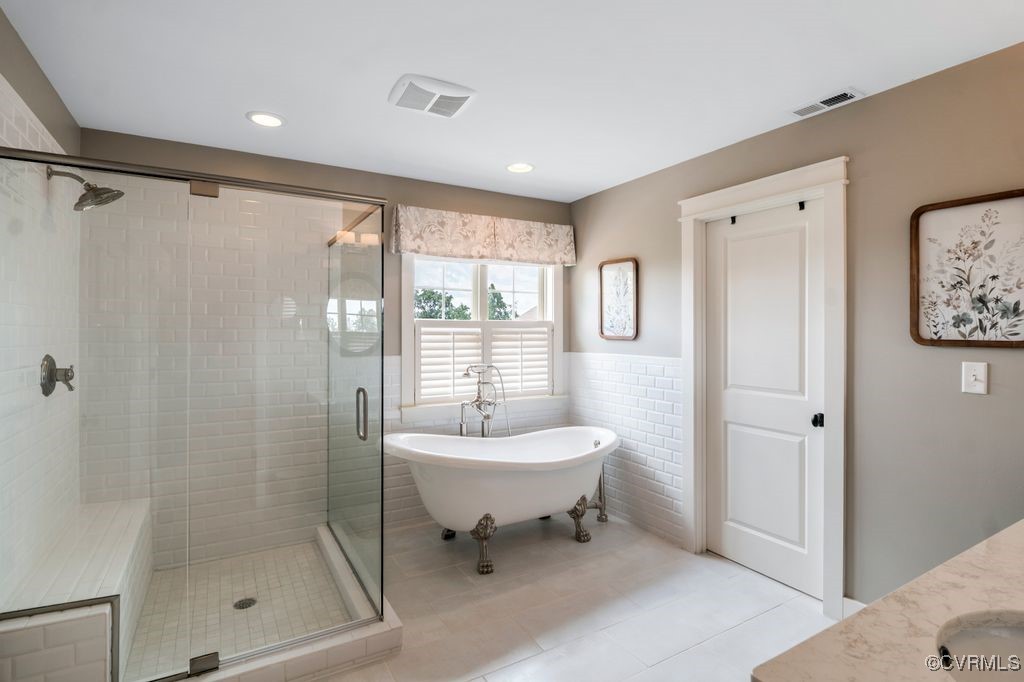 16413 Lambourne Road Midlothian, VA 23112 - Photo 19 of 33 a bathroom with a sink mirror and a shower