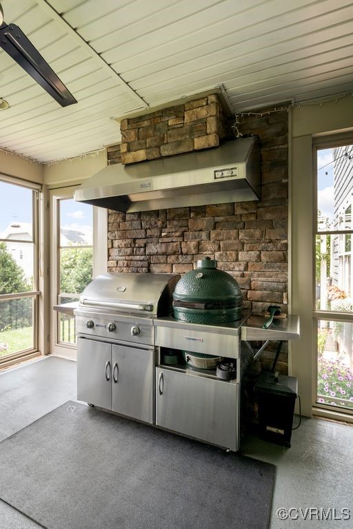 16413 Lambourne Road Midlothian, VA 23112 - Photo 23 of 33 a kitchen with a stove and a microwave