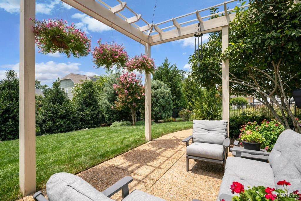 16413 Lambourne Road Midlothian, VA 23112 - Photo 25 of 33 a view of a patio with couches plants and large trees