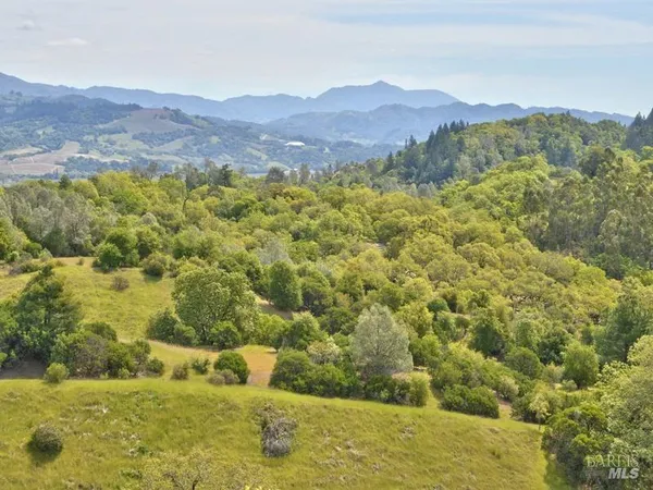 a view of a mountain with an outdoor space