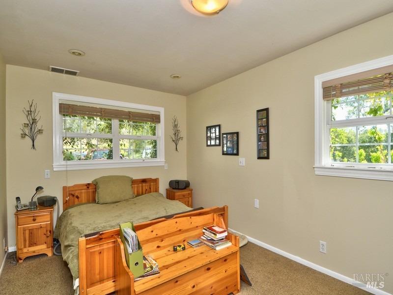 950 Canyon Road Geyserville, CA 95441 - Photo 9 of 23 a bedroom with a bed and a window