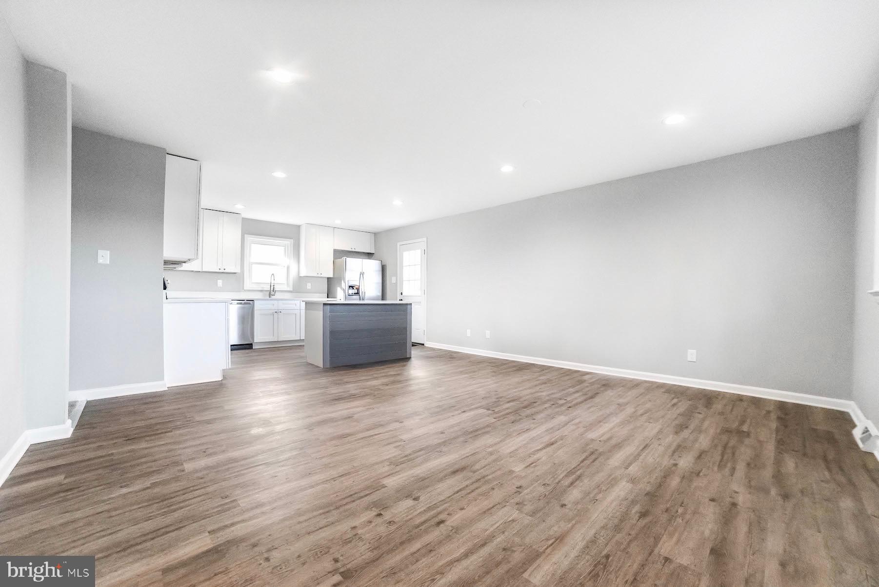 48931 Chisleytown Road St. Inigoes, MD 20684 - Photo 10 of 36 Large family room opens to kitchen